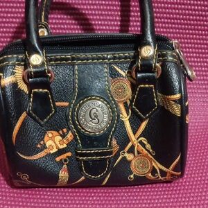 Elegant Black and Gold Mini Bag by Rochas